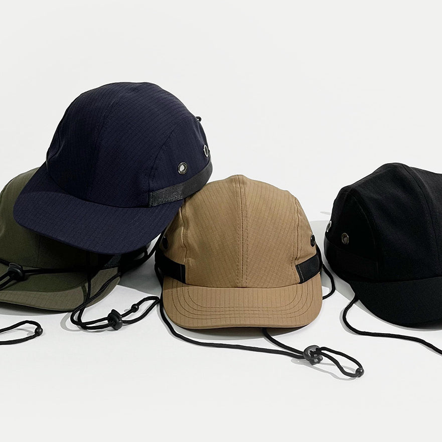 Mechanical Drawstring Cap