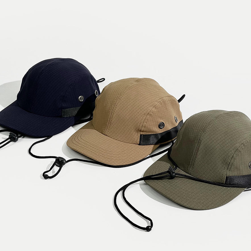 Mechanical Drawstring Cap