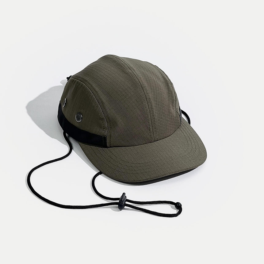 Mechanical Drawstring Cap